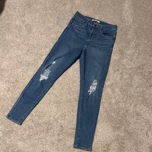 Levi's Light Wash Distressed Mile High Skinny Jeans